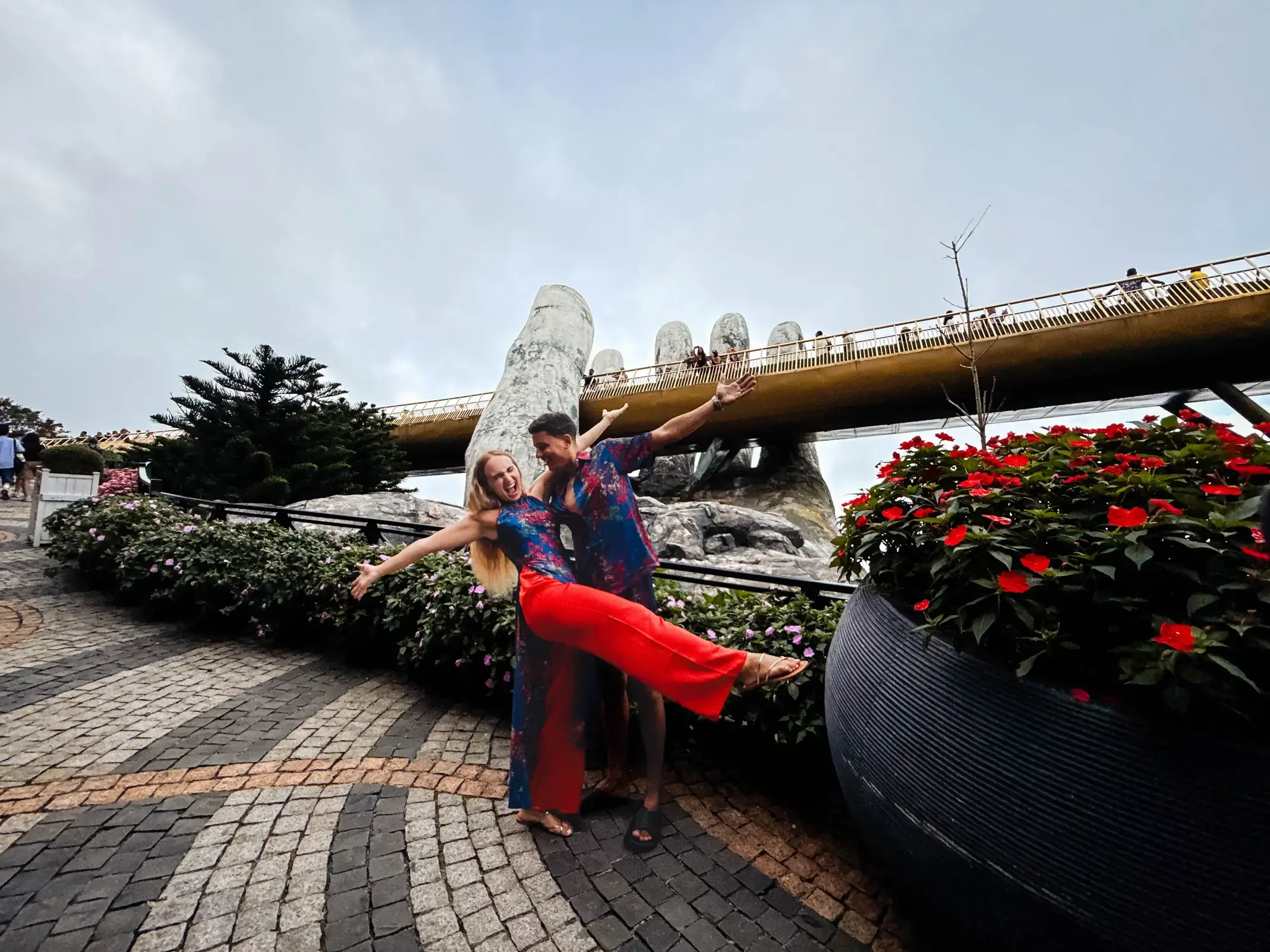 Andrei and Cristina posing at the Golden Bridge in Da Nang, Vietnam