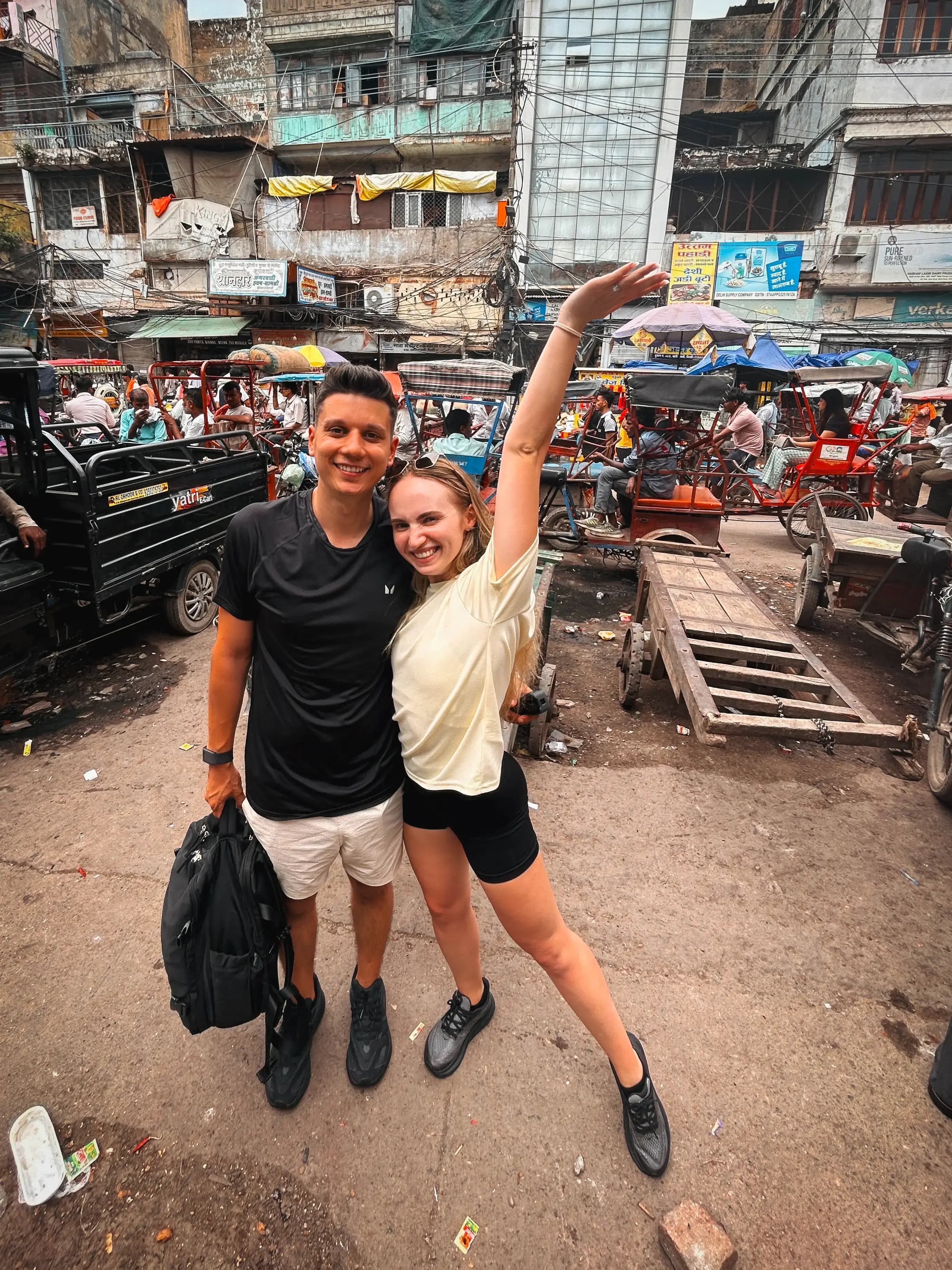 Andrei and Cristina posing in the busy streets of Old Delhi